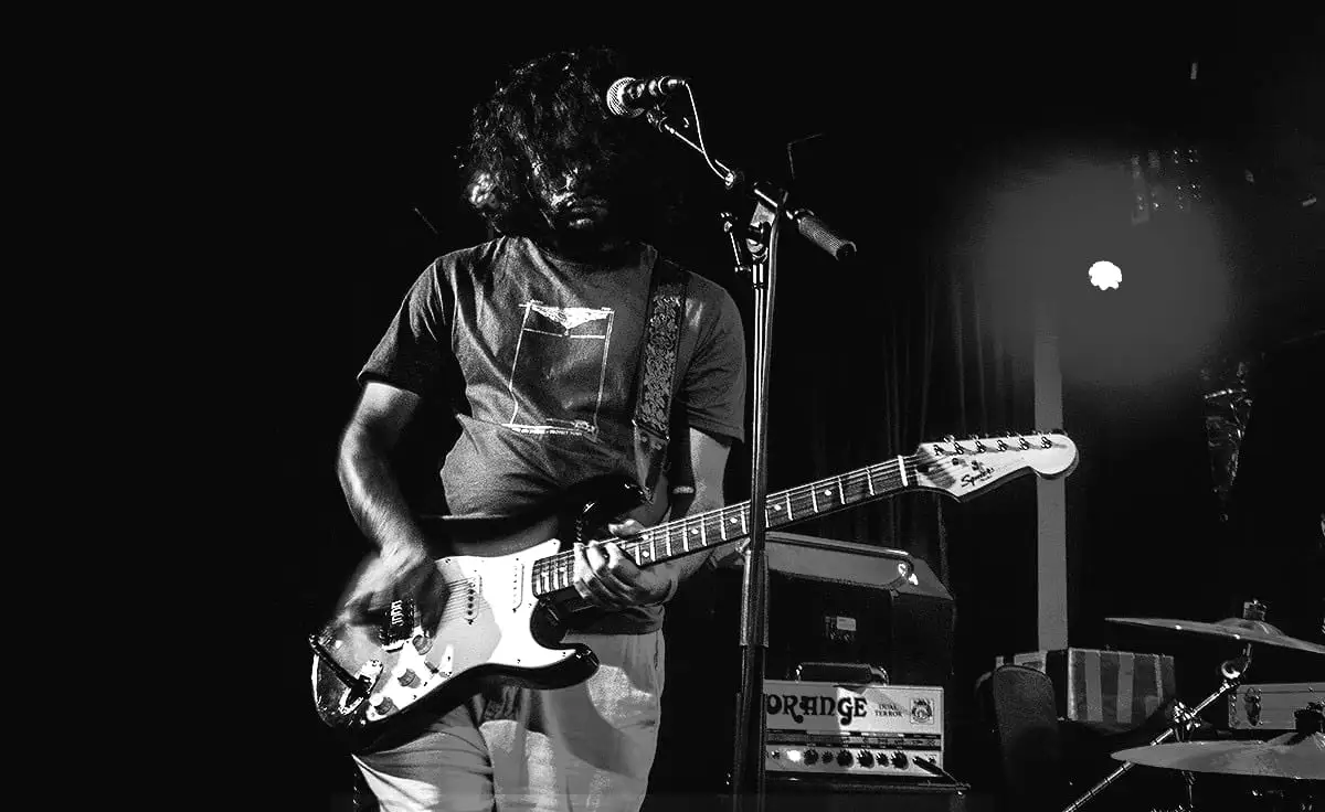 Classic high-contrast live shot of the band